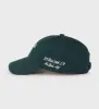 The Carlyle Souvenir Hat - Forest/White sold by Sporty and Rich