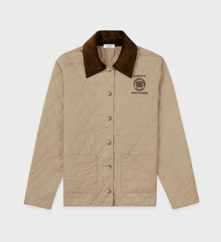Crest Seal 100th Quilted Jacket - Beige/Chocolate sold by Sporty and Rich
