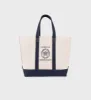 Crest Seal Tote Bag - Natural/Navy sold by Sporty and Rich