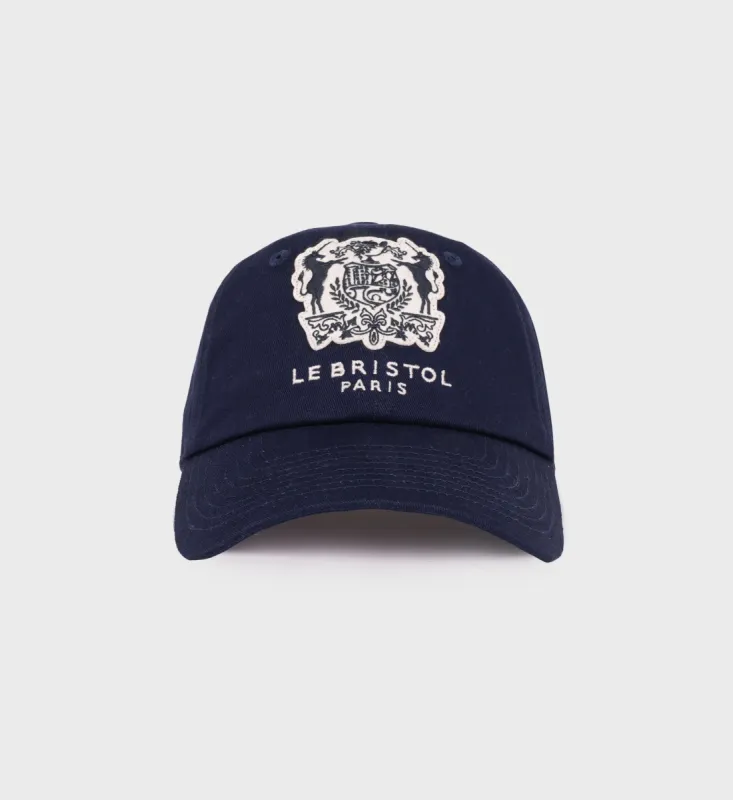 Bristol Crest Hat - Navy/Cream sold by Sporty and Rich