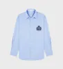 H&W Crest Oversized Shirt - Washed Hydrangea/Navy sold by Sporty and Rich