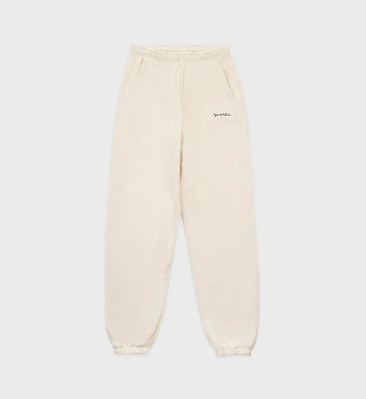 Serif Logo Sweatpant - Cream/Navy sold by Sporty and Rich