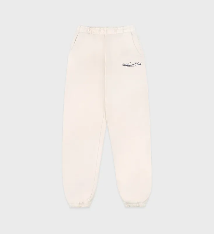 Wellness Club Embroidered Sweatpant - Cream/Navy sold by Sporty and Rich