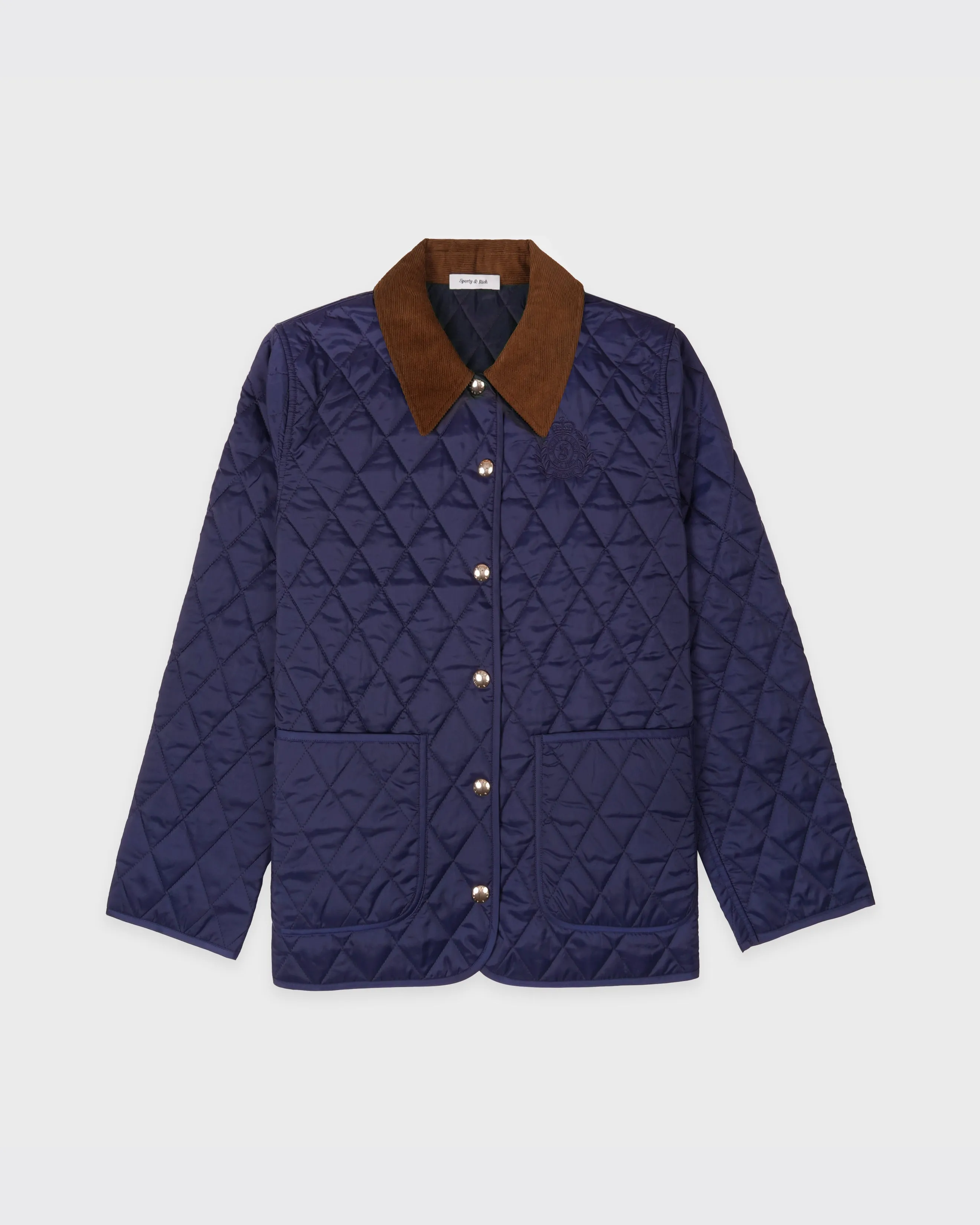 NY Crest Nylon Quilted Jacket - Navy/Tan sold by Sporty and Rich