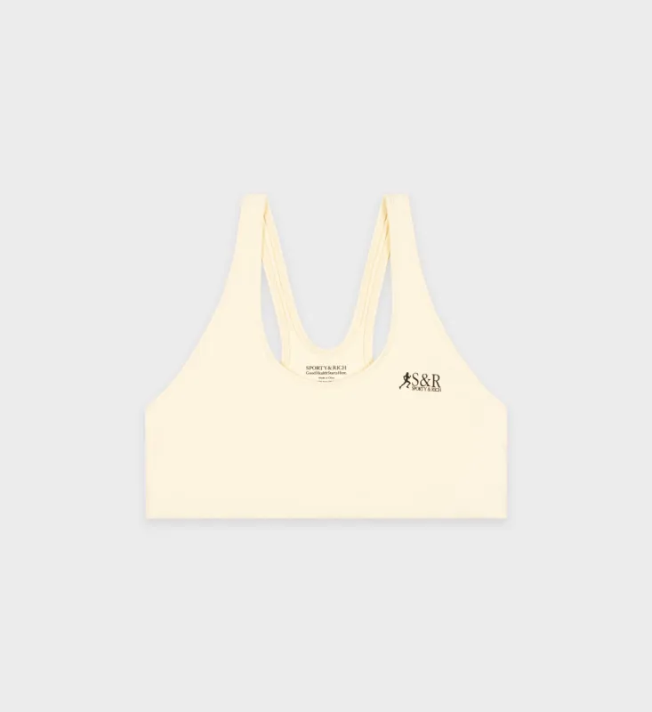 SR Runner Sports Bra - Almond/Black sold by Sporty and Rich