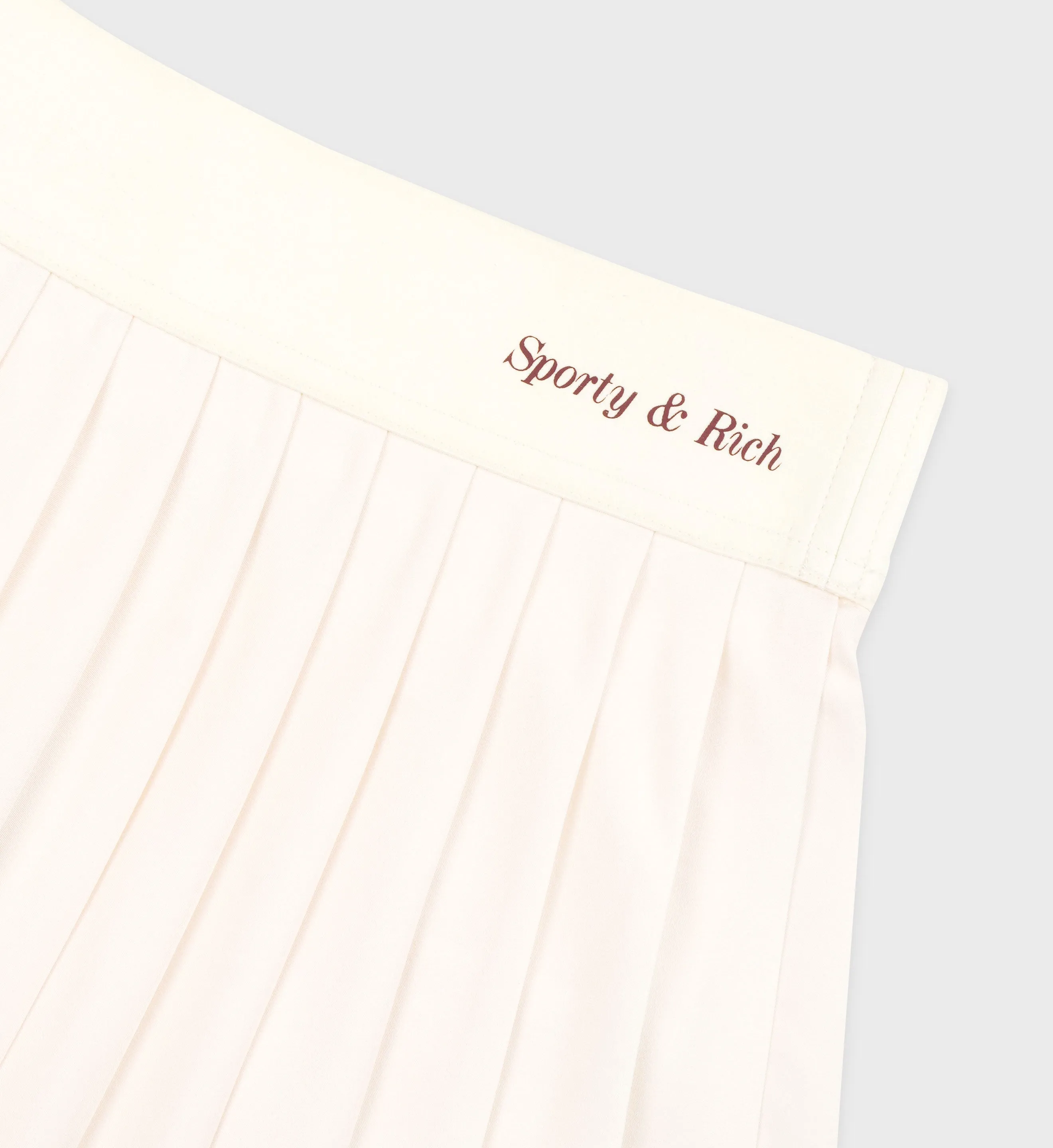 Classic Logo Pleated Skirt - Off White/Merlot sold by Sporty and Rich product image thumbnail 3