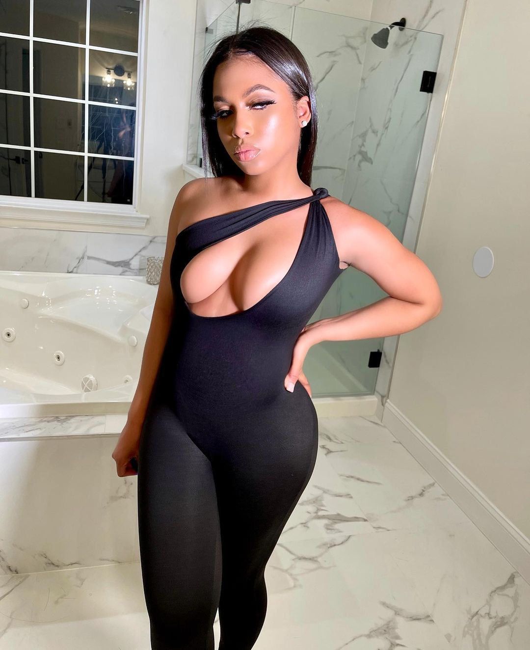 Sculpt Cut Out Jumpsuit - Black sold by Sassyluxe