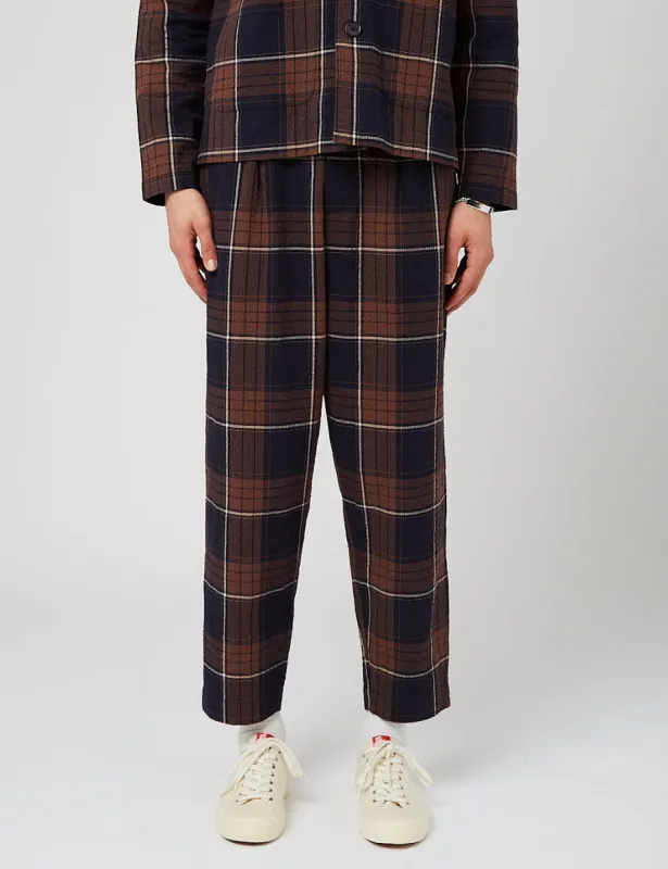 Universal Works Pleated Track Pant (Tapered) - Brown/Navy sold by Article London