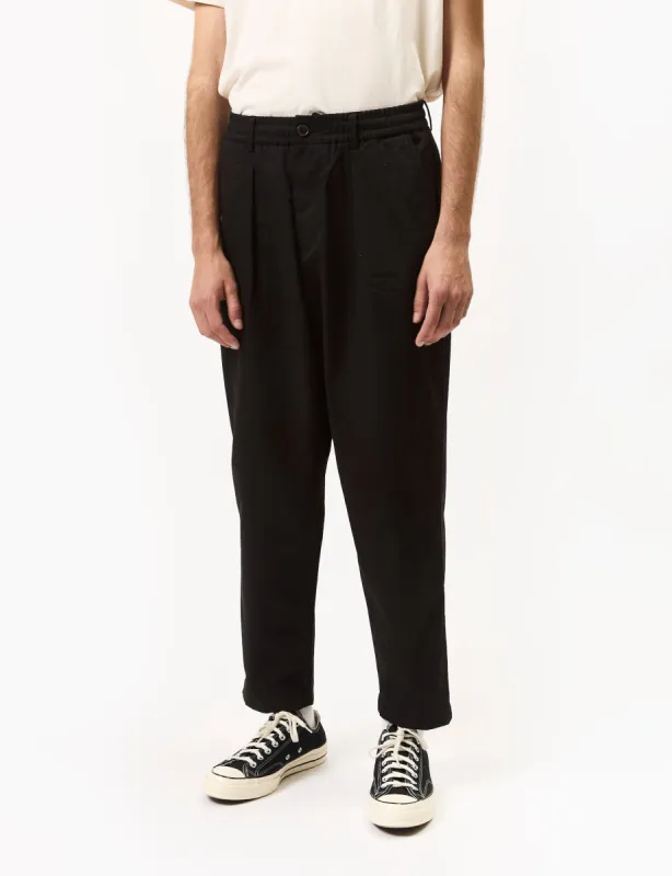 Universal Works Pleated Track Pant (Twill) - Black sold by Article London
