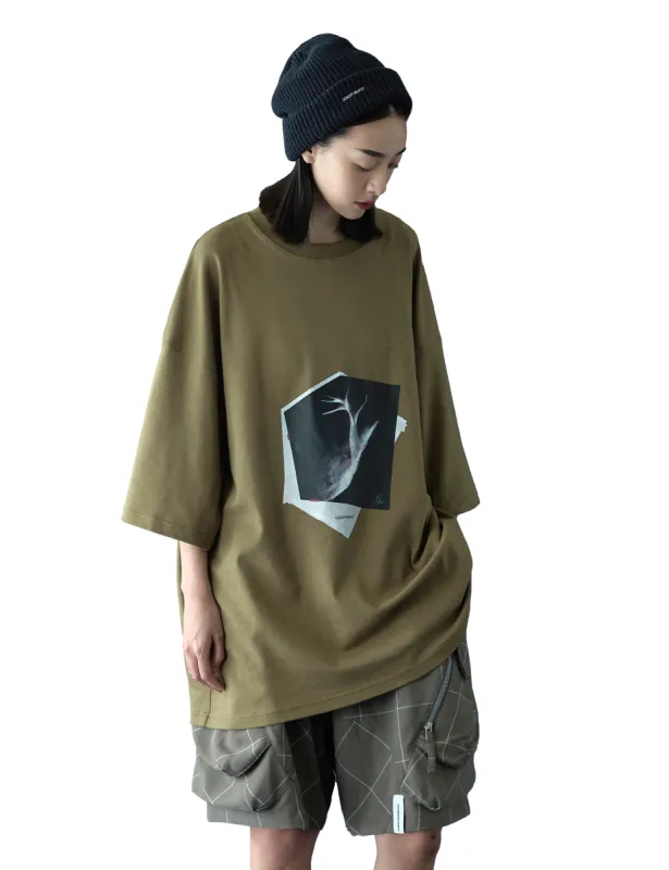 GOOPiMADE Nes-03 "Gewicht" Graphic T-Shirt - Moss Green sold by Article London