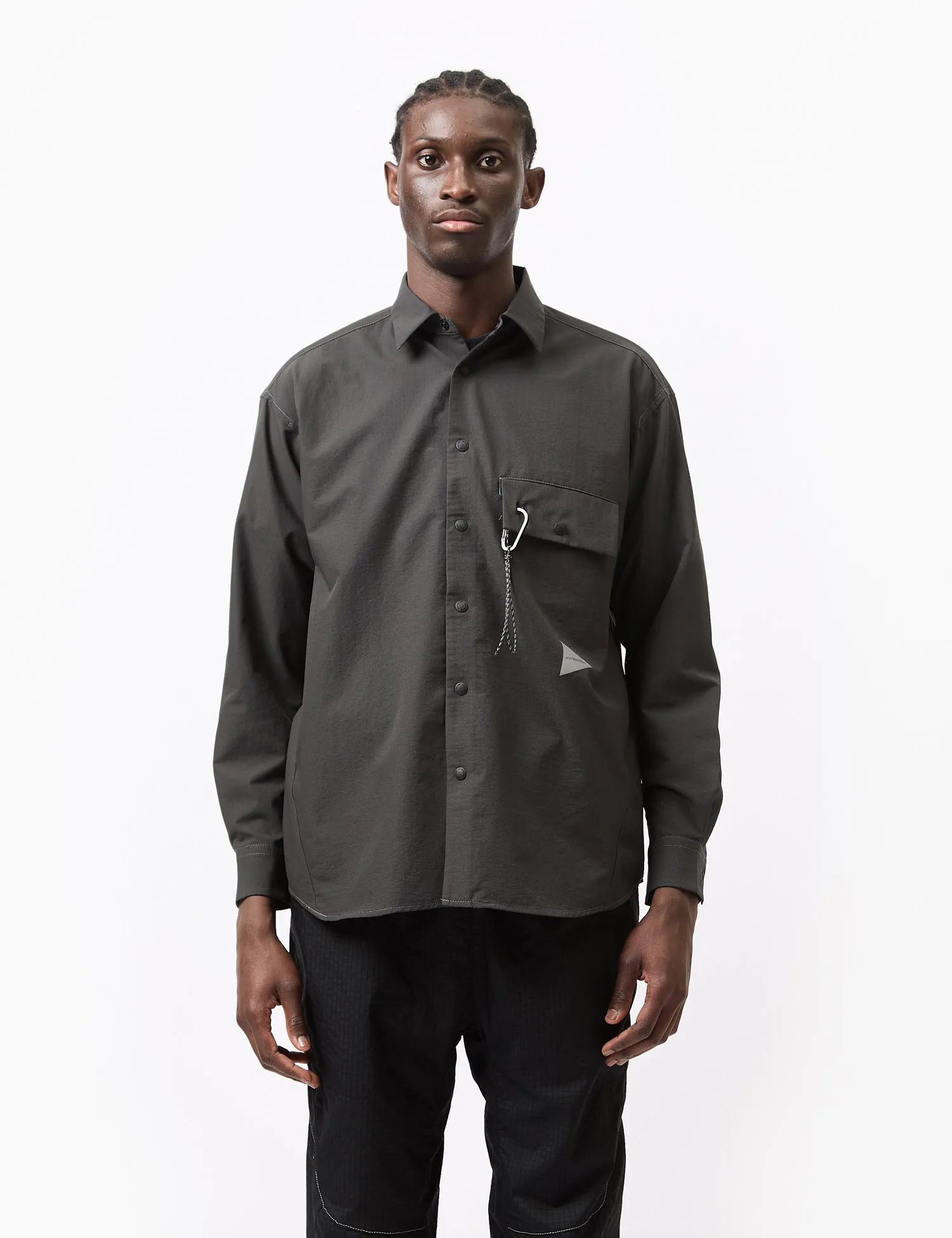 and Wander Dry Breathable Shirt - Charcoal Grey sold by Article London