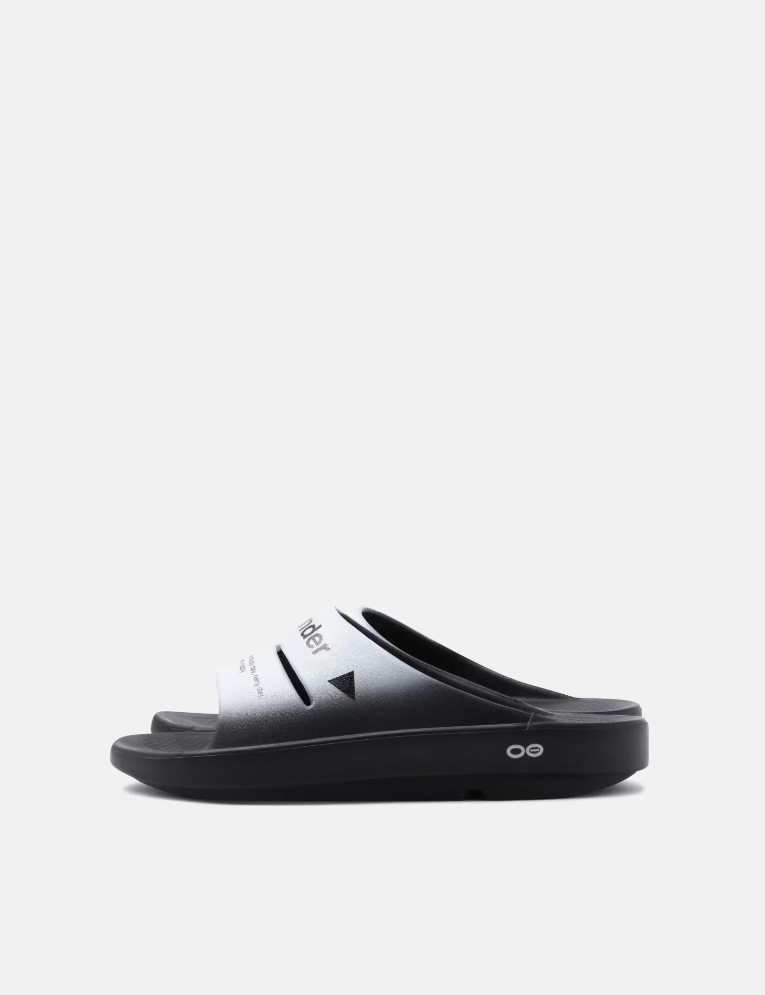 and Wander x Oofos Ooahh Recovery Slider - Black sold by Article London
