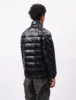 and Wander Diamond Stitch Down Jacket - Black sold by Article London