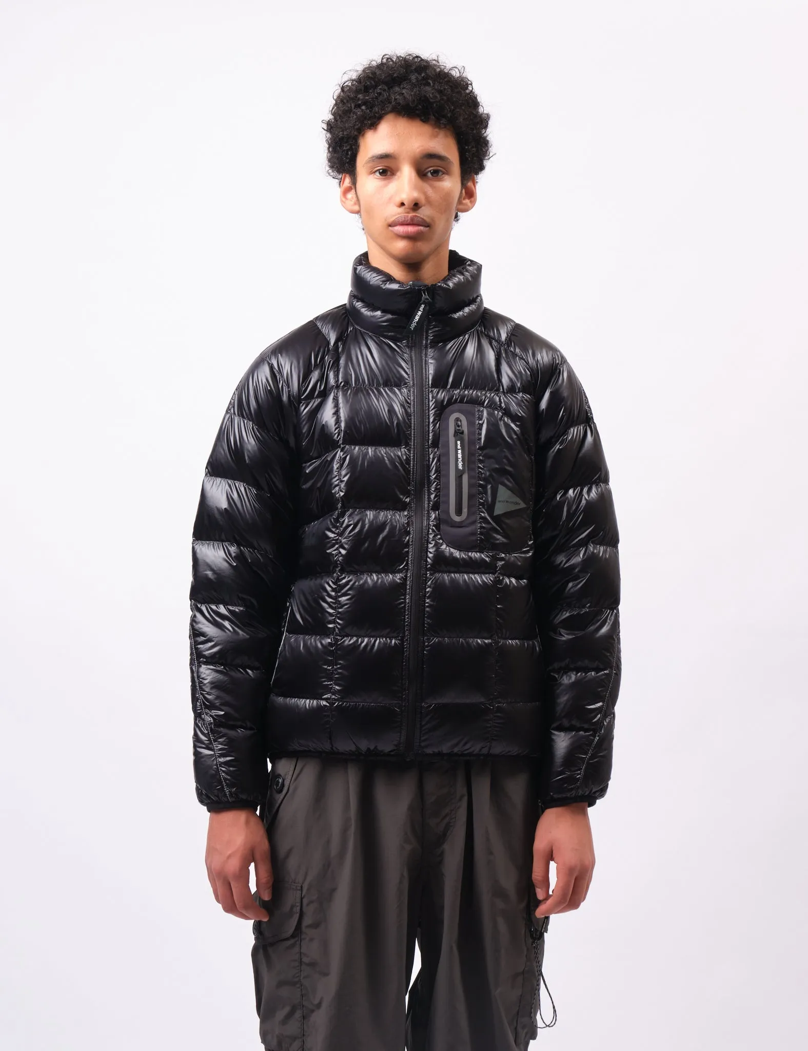 and Wander Diamond Stitch Down Jacket - Black sold by Article London