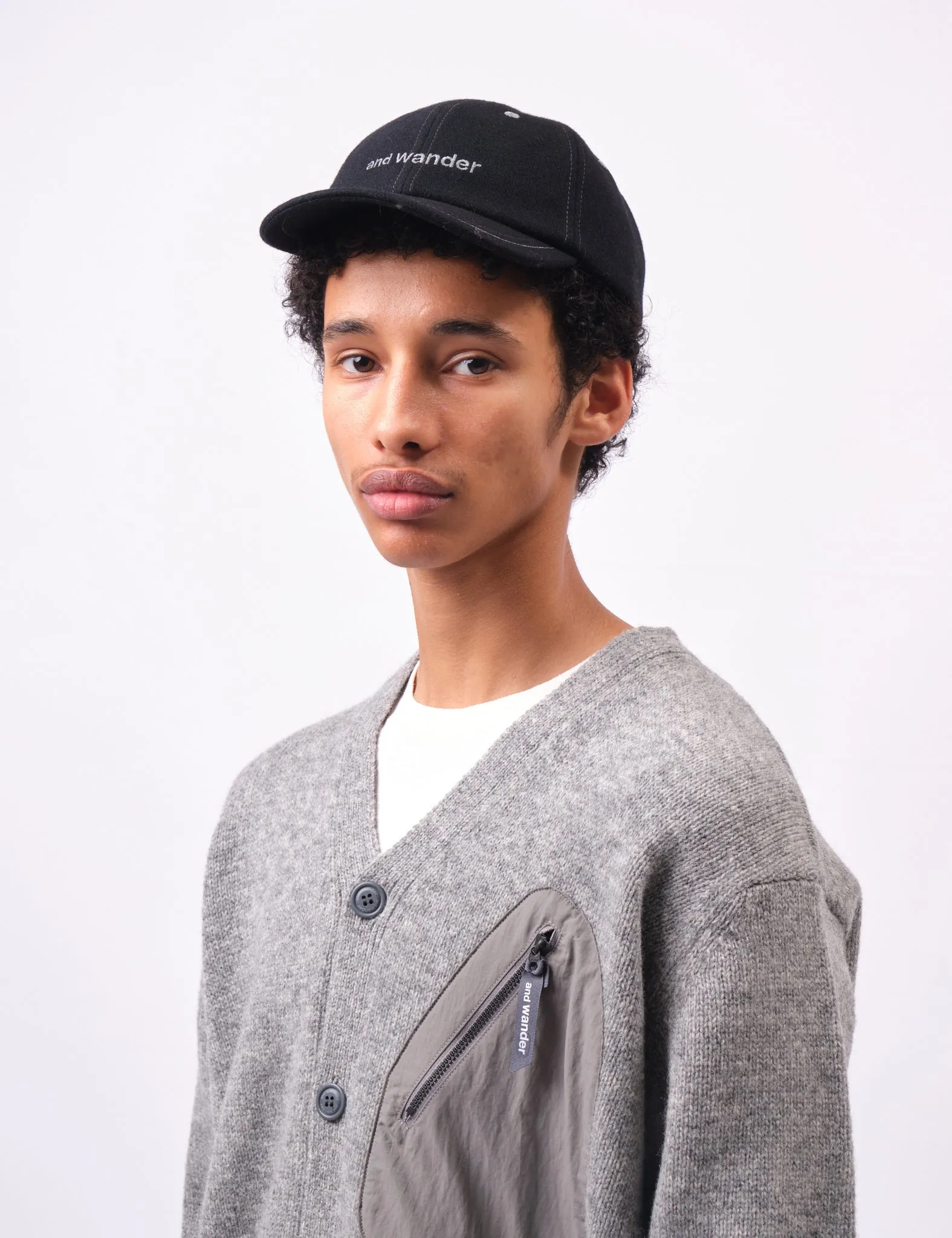 and Wander Wool Melton Cap - Black sold by Article London