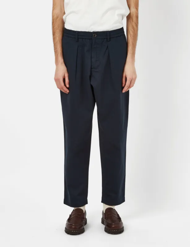 Universal Works Pleated Track Pant (Relaxed) - Navy Blue sold by Article London