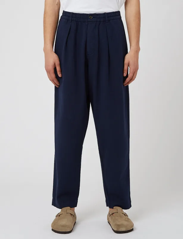Universal Works Pleated Track Pants (Recycled Cotton) - Navy Blue sold by Article London