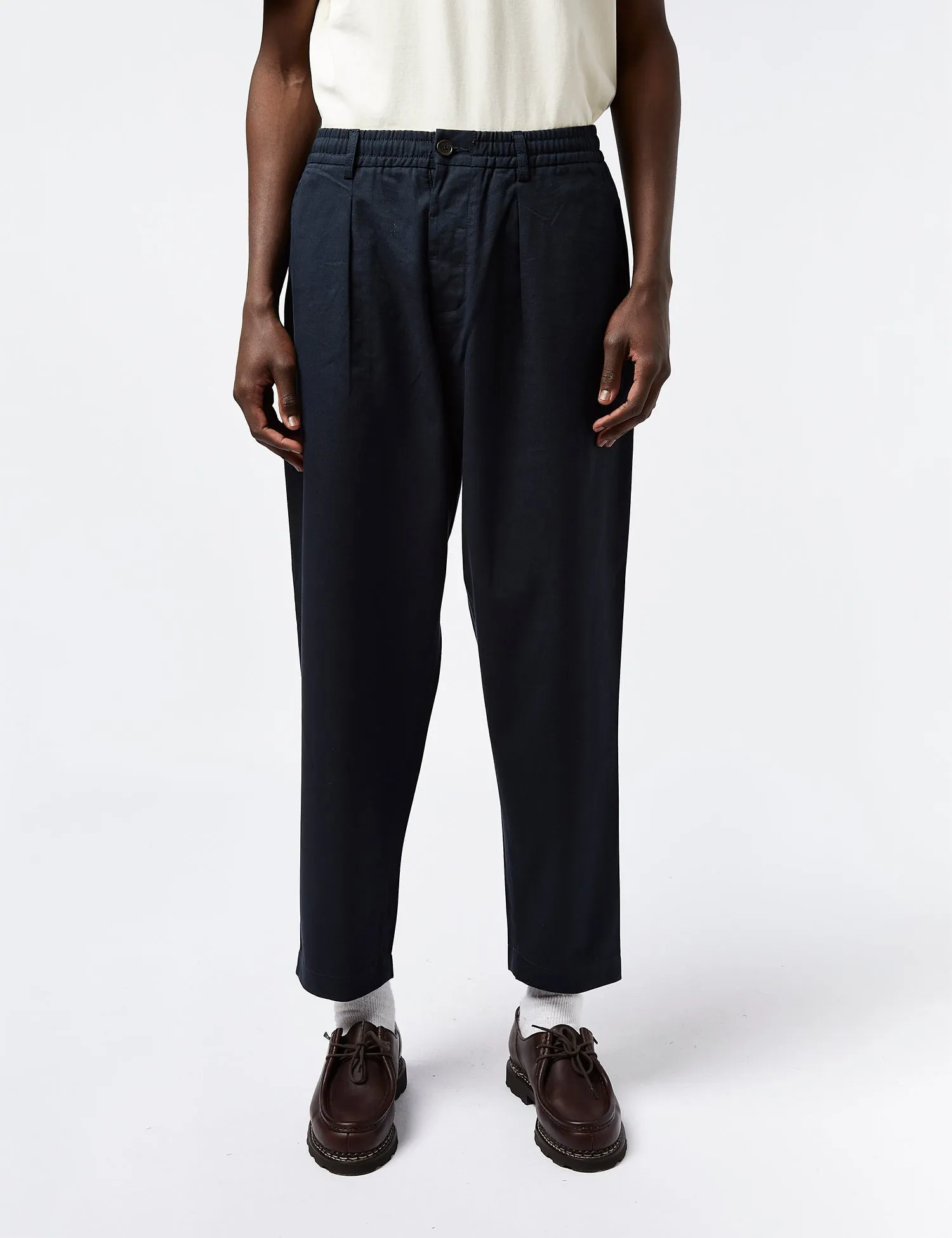 Universal Works Pleated Track Pant (Twill) - Navy Blue sold by Article London