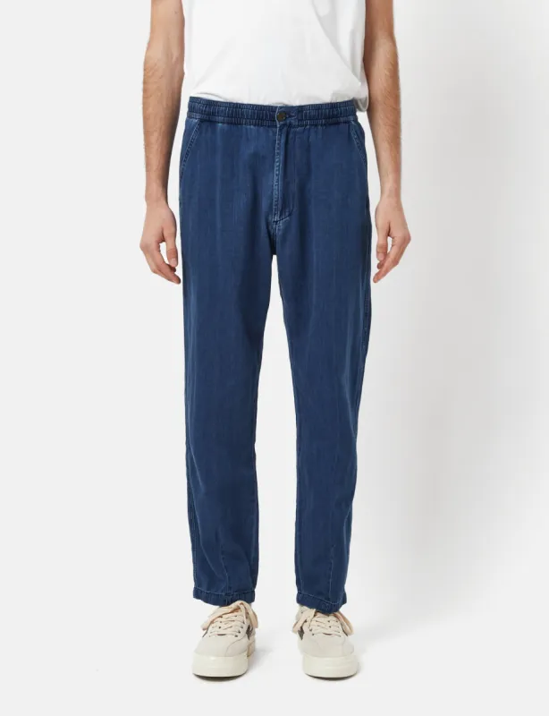 Universal Works Pleated Track Pant (Herringbone Denim) - Faded Indigo sold by Article London