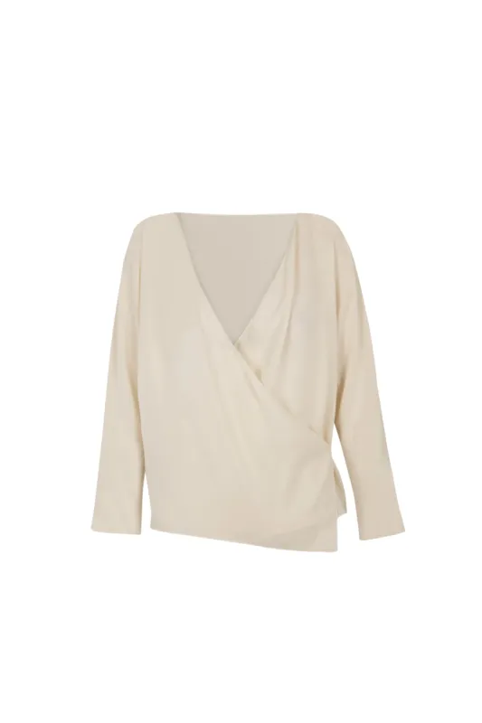 Sara, blusa cruzada en seda crudo sold by Cortana