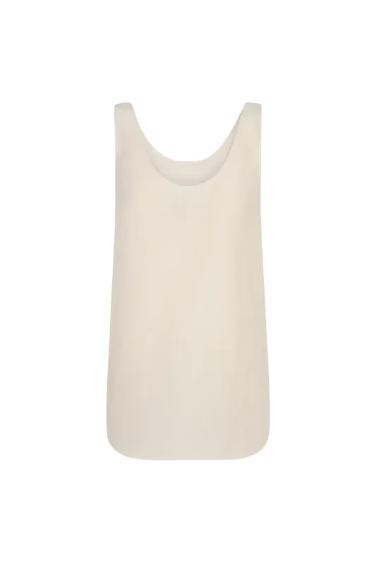 Simona, top en lino y seda marfil sold by Cortana