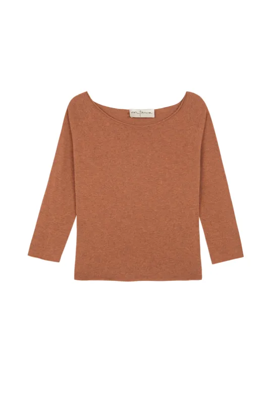 Mikela, jersey en punto naranja sold by Cortana