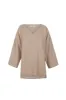 Riu, top en lana zelander beige sold by Cortana