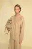 Riu, top en lana zelander beige sold by Cortana