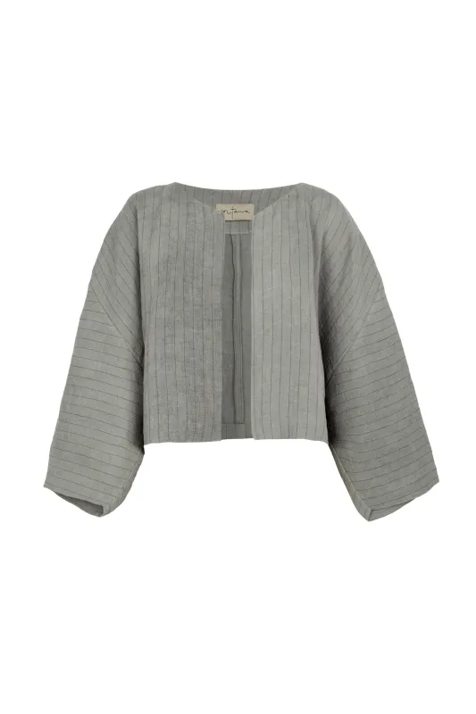 Lupe, chaqueta de lino de rayas azul cielo sold by Cortana