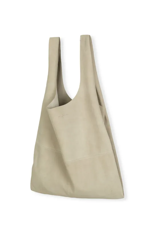 U XL, bolso de cuero marfil sold by Cortana
