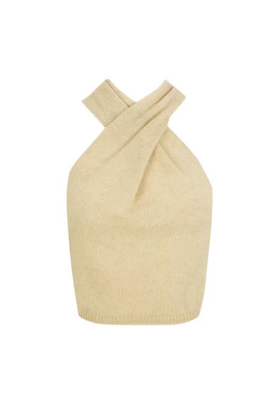 Lux, top halter de punto marfil sold by Cortana
