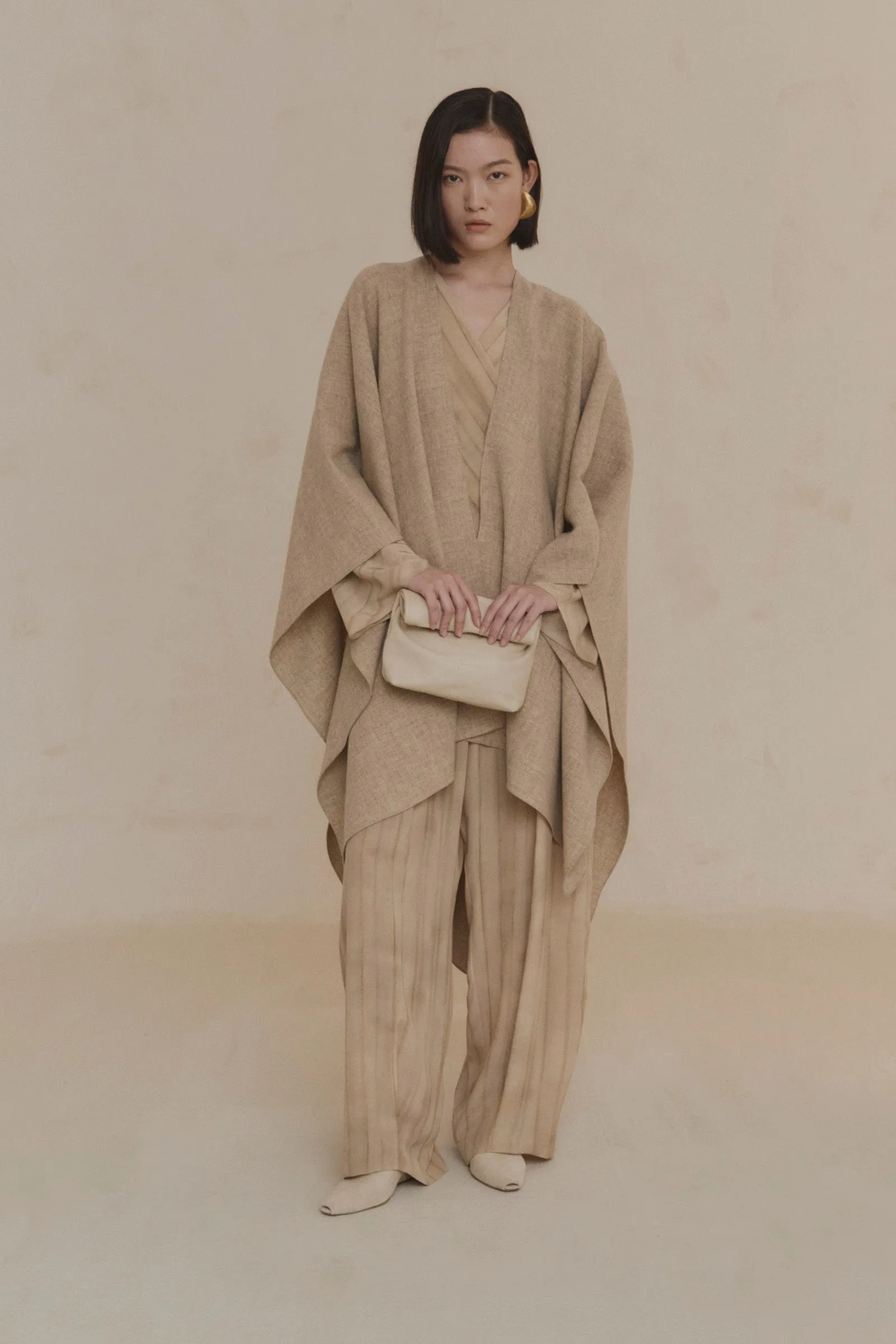 Poncho, abrigo de lana beige melange sold by Cortana product image thumbnail 2