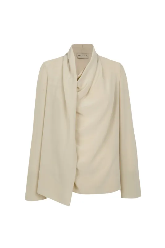 Lyra, blusa asimetrica de seda beige sold by Cortana
