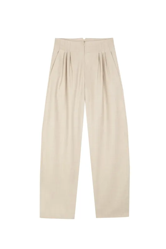 Cuento, pantalon de lana virgen beige sold by Cortana