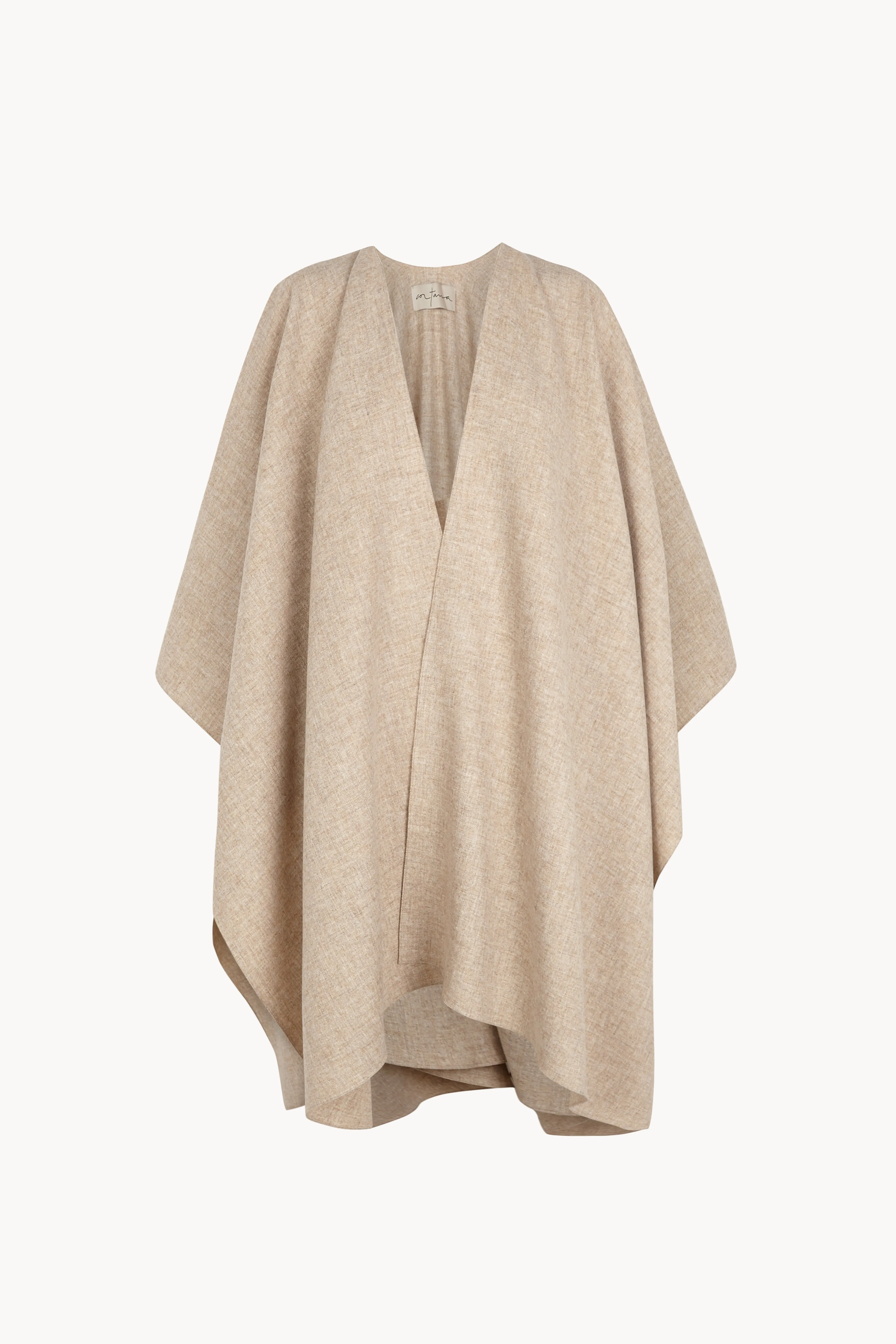 Poncho, abrigo de lana beige melange sold by Cortana