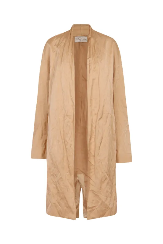 Peaches, chaqueta melocotón sold by Cortana