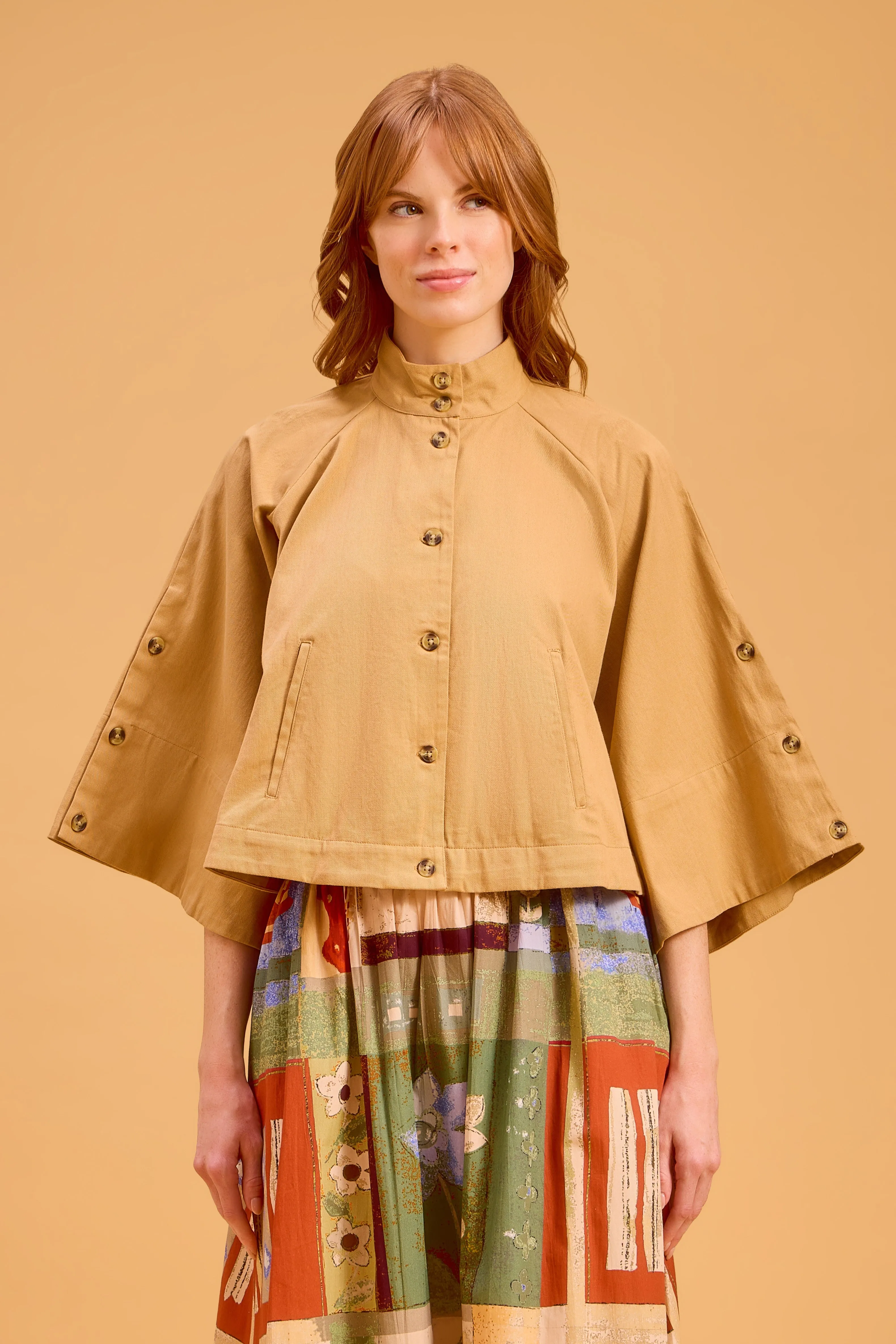 Capelet, Tan sold by Olivia by Livro