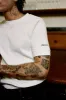 fitted t-shirt oat sold by about:blank