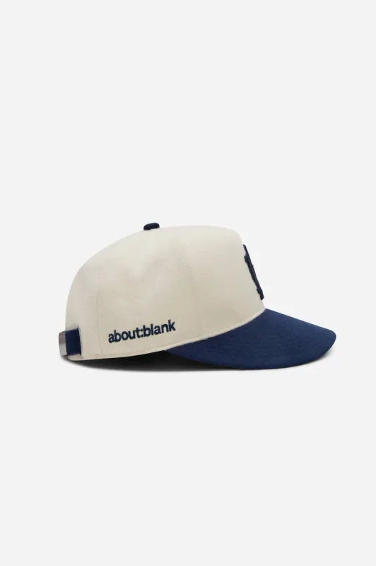 monogram wool cap ecru/navy sold by about:blank