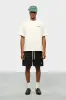 monogram track short black/ecru sold by about:blank