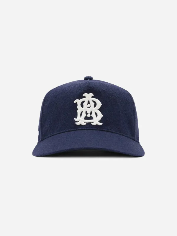 monogram cap wool navy/ecru made by about:blank