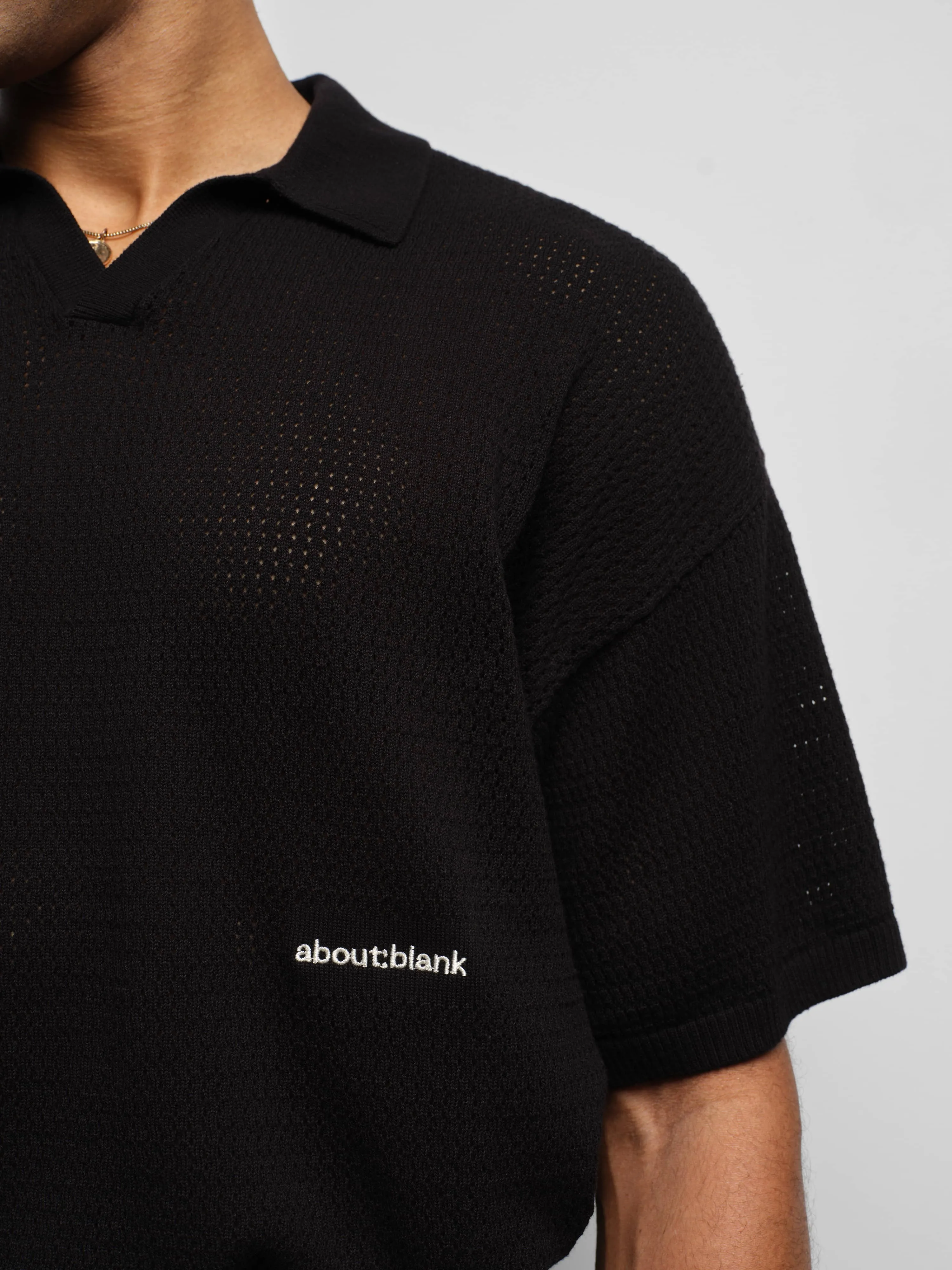 resort knit polo black sold by about:blank product image thumbnail 4