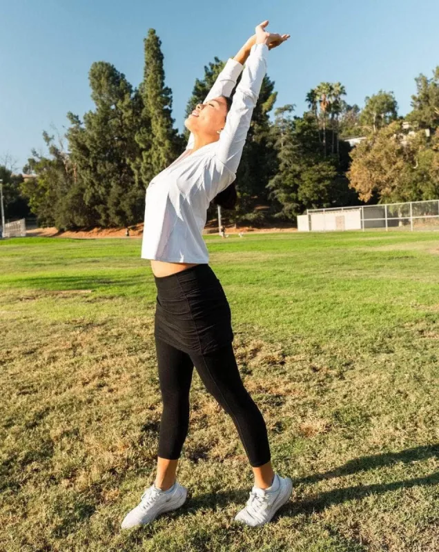 Black Mid-Calf Skirted Leggings with Pockets sold by Sol Sister Sport