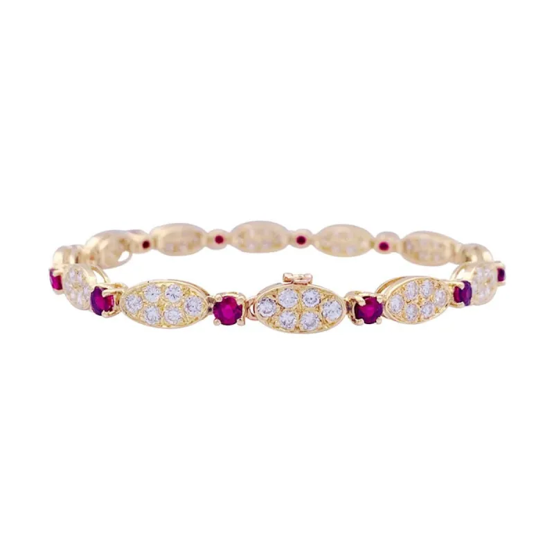 Bracelet vintage Van Cleef & Arpels, diamants, rubis, or jaune. sold by 58 Facettes