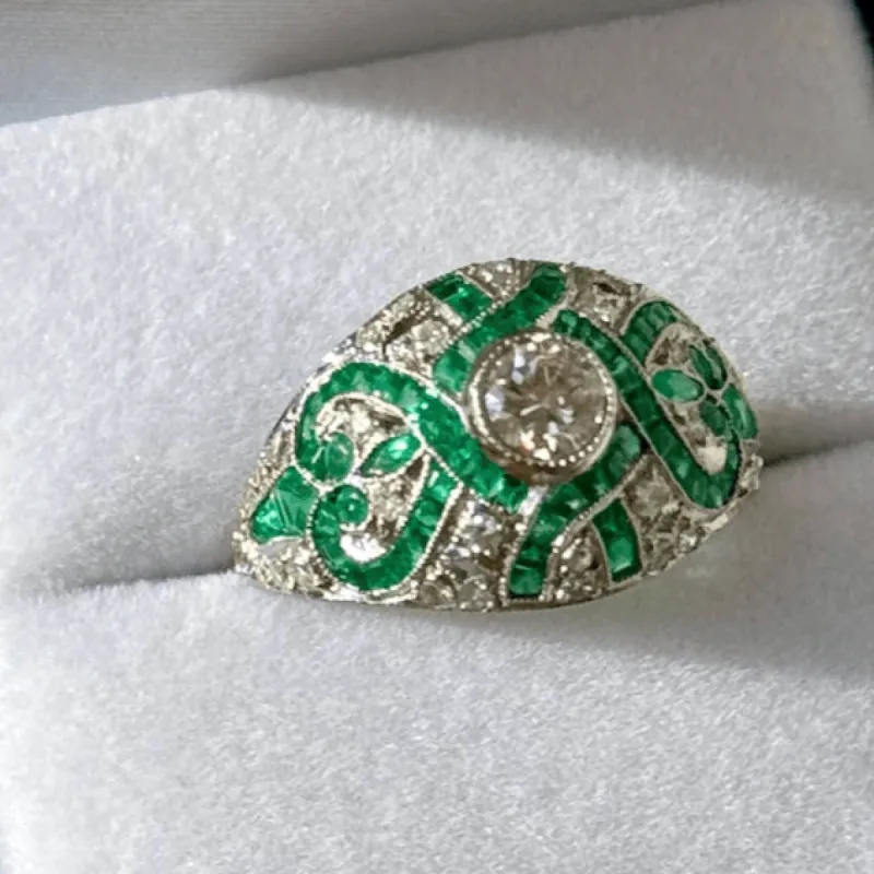 Bague style art déco platine diamants émeraudes sold by 58 Facettes