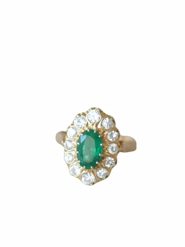 Bague marquise Emeraude entourage diamants sold by 58 Facettes