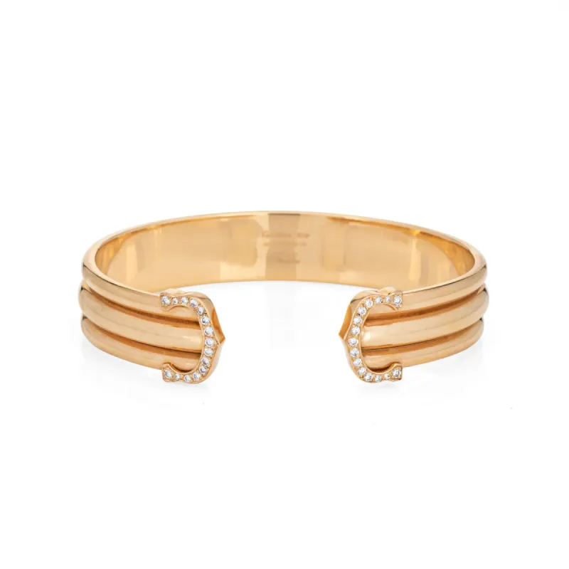 Cartier - Bracelet manchette Vintage Double C de Cartier Or jaune Diamants sold by 58 Facettes