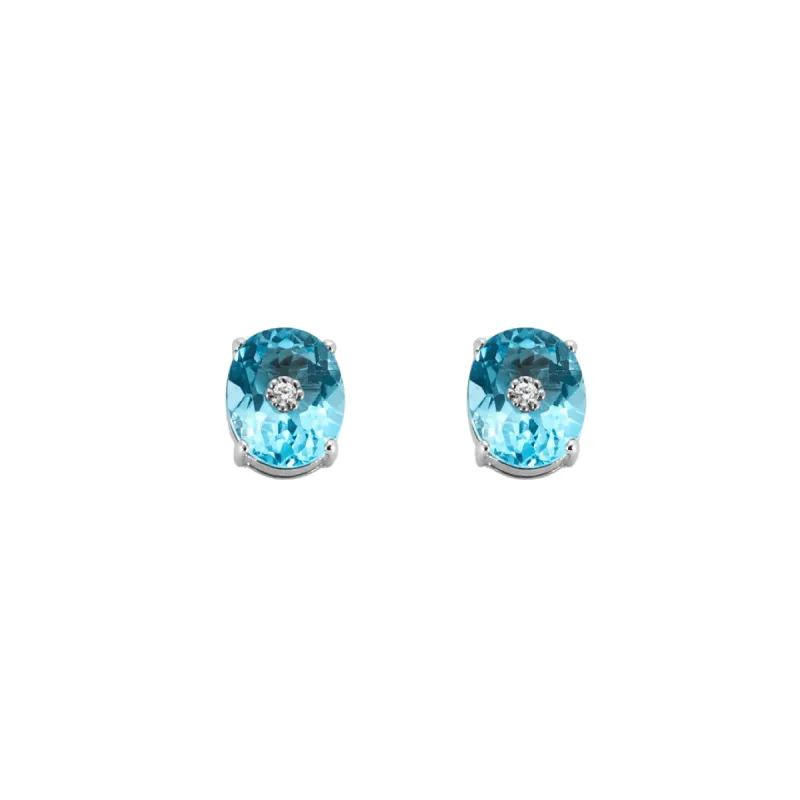 Paire de boutons d'oreilles en or blanc ornées de 2 topazes et 2 diamants sold by 58 Facettes