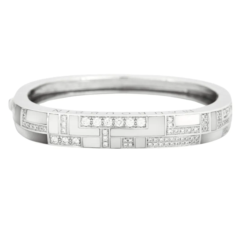 MAUBOUSSIN - Belle de jour - Bracelet manchette sertie de diamants et nacre sold by 58 Facettes
