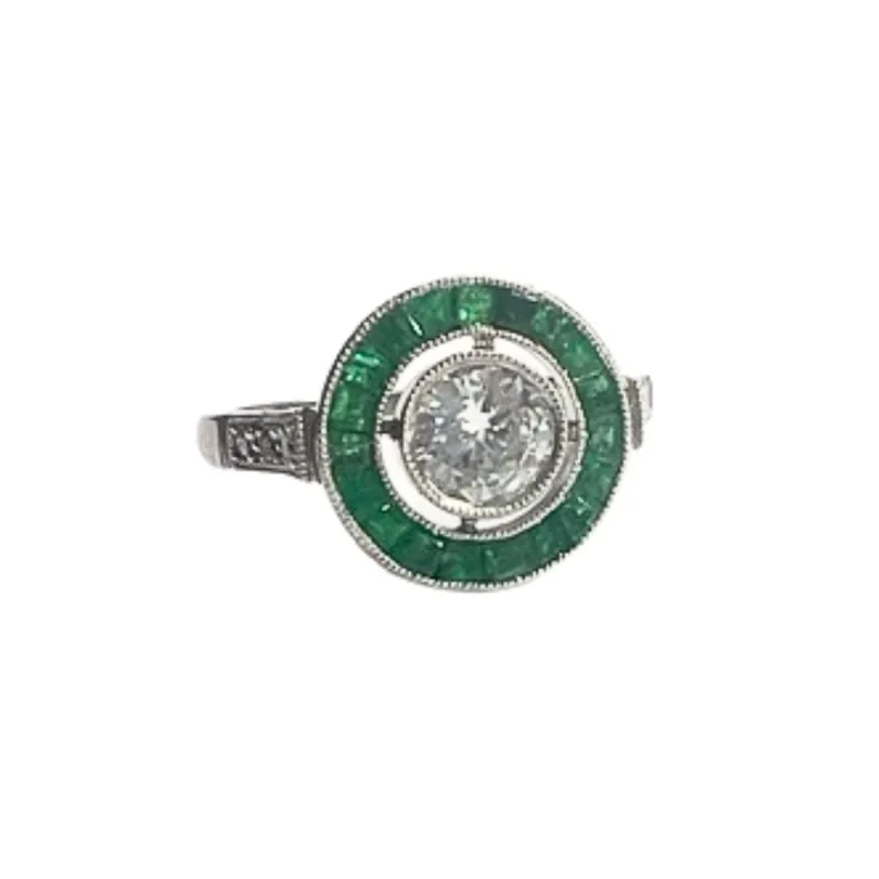 Bague Art Déco émeraudes diamants sold by 58 Facettes